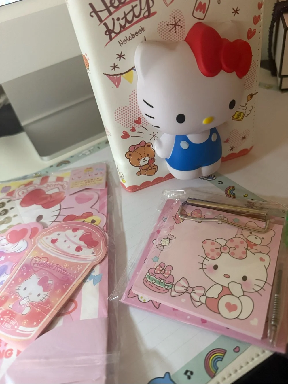 Sanrio Hello Kitty White Figure with Blue Outfit and Red Bow